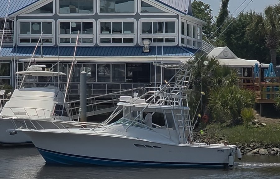No Reservations, MacReel Charters' 36' Luhrs, docked at Harbourgate Marina