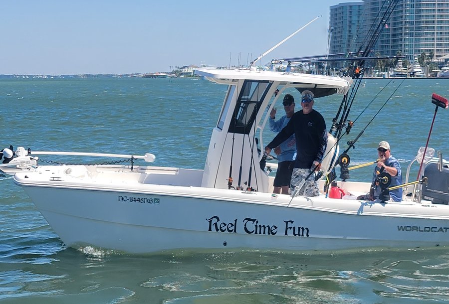 Reel Time Fun, MacReel Charters' 24' WorldCat, out on the water with anglers aboard